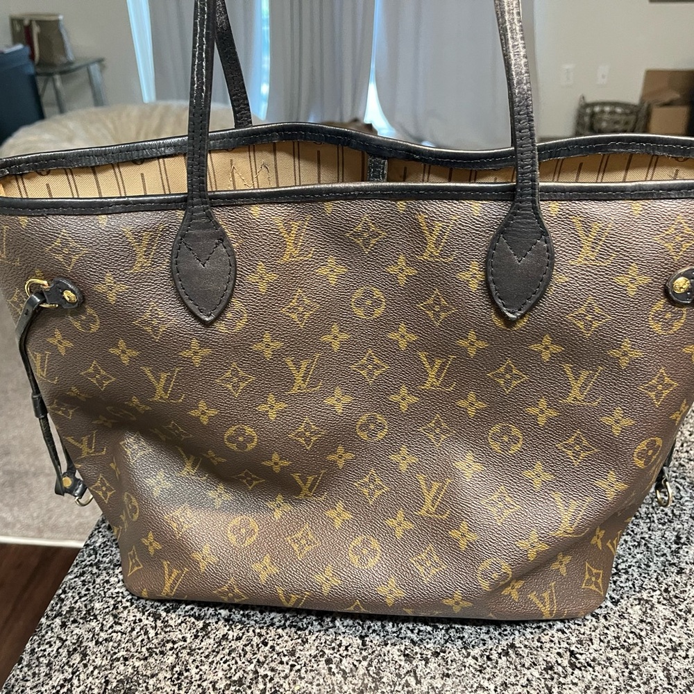 Louis Vuitton Neverfull with black vachetta